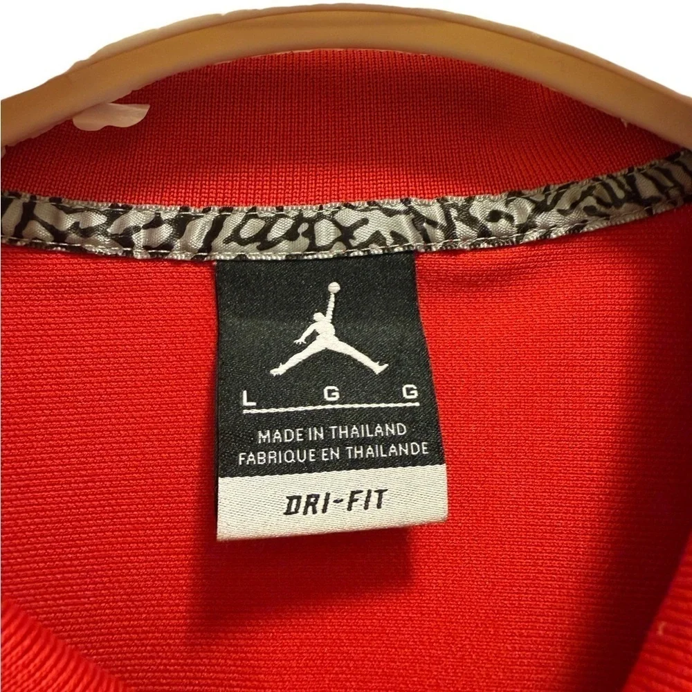 Jordan Polo Shirt Classic,with a lion and the Wisconsin logo, in new conditions